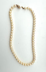 A lovely late 1980s Mappin and Webb Akoya pearl necklace with 18carat gold clasp in orignal box