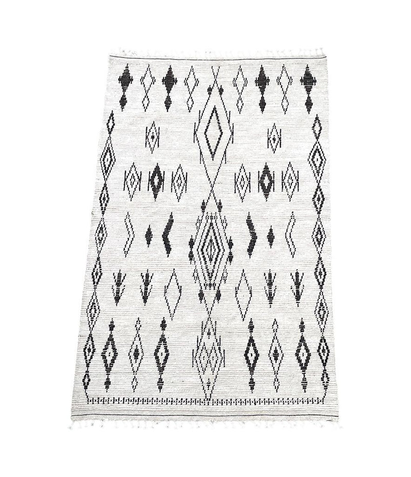 A vintage handwoven Moroccan berber rug, with tribal diamond and line pattern by the Beni Ouarian tribe