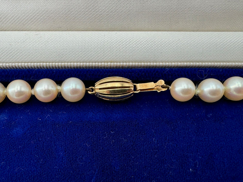 A lovely late 1980s Mappin and Webb Akoya pearl necklace with 18carat gold clasp in orignal box