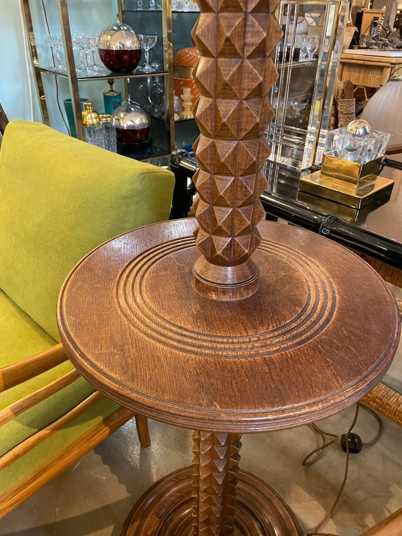 A French 1940s brutalist oak floor lamp attributed to Charles Dudouyt with central circular table