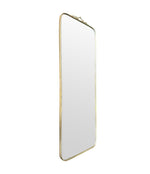 Mid century brass framed mirror with slim profile and scroll top detail